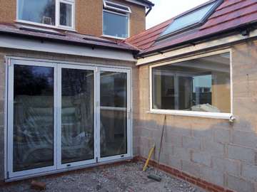 Mrs F. Heswall Wirral. : Installation of triple Glazed Centor C1 Bi Fold doors with Allstyle triple glazed fixed frame - standard white 